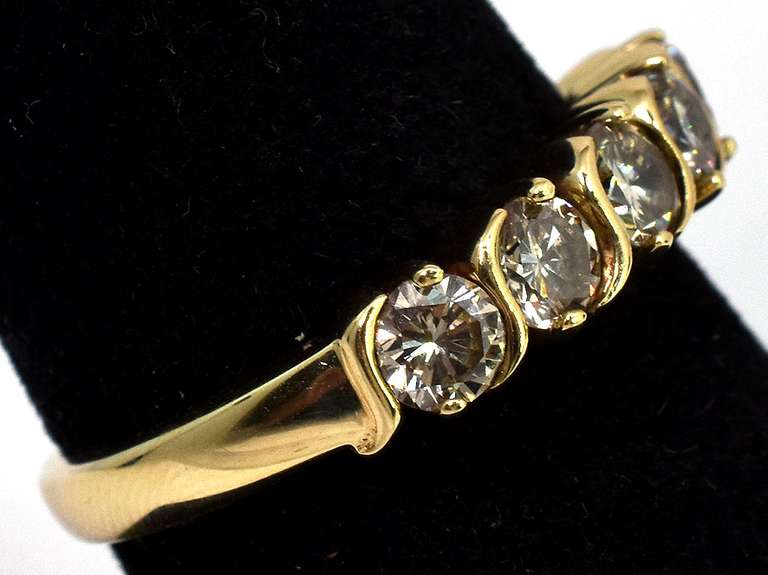Dazzling 0.80CTW Diamond band in 14KT Yellow Gold