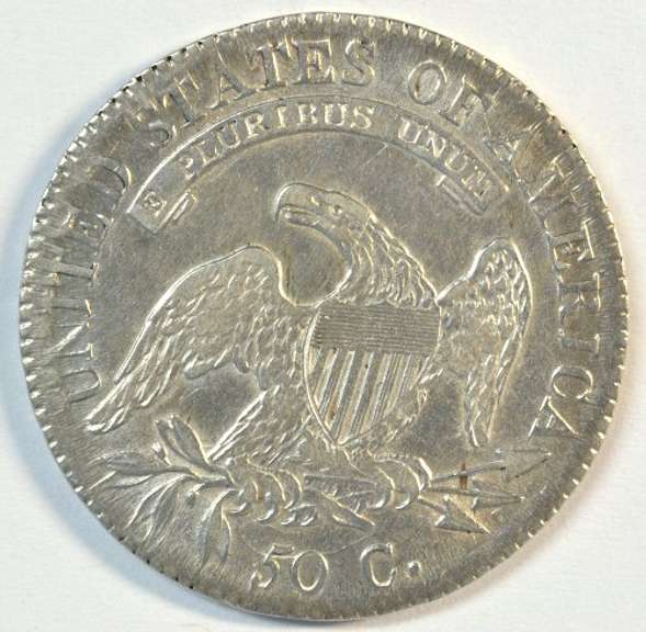 Lustrous AU 1817 Capped Bust Half Dollar. Cleaned