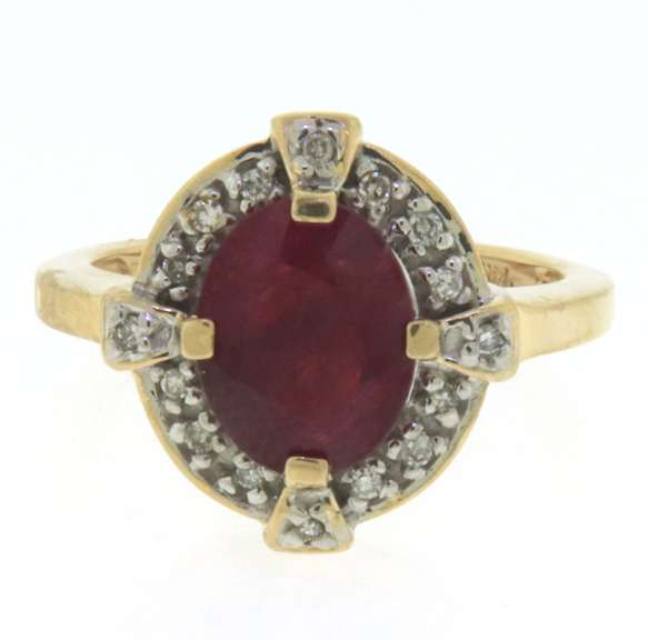 Handsome Oval Ruby and Diamond Halo Ring