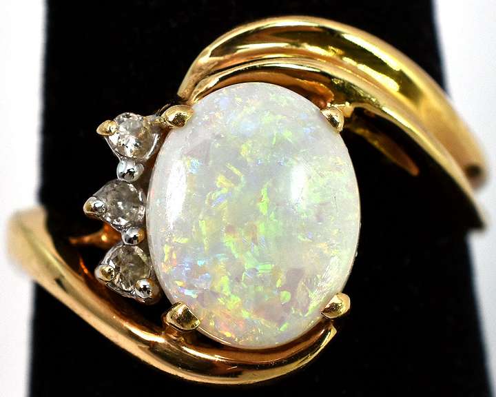Enchanting Framed Opal & Diamond Ring in 14KT Yellow Gold