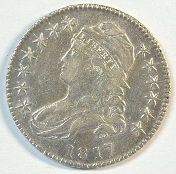 Lustrous AU 1817 Capped Bust Half Dollar. Cleaned