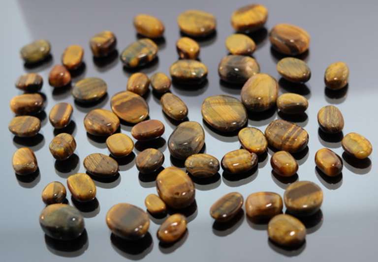 Huge collection of Tigerseye cabochons weighing 325 carats!
