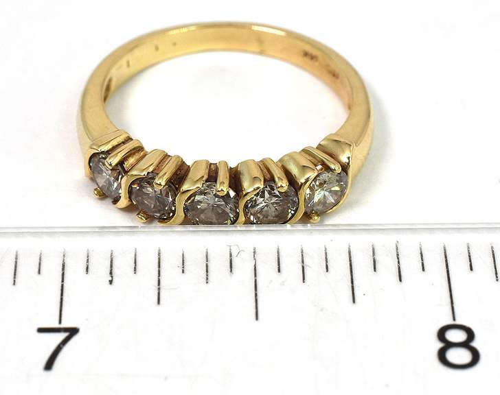 Dazzling 0.80CTW Diamond band in 14KT Yellow Gold