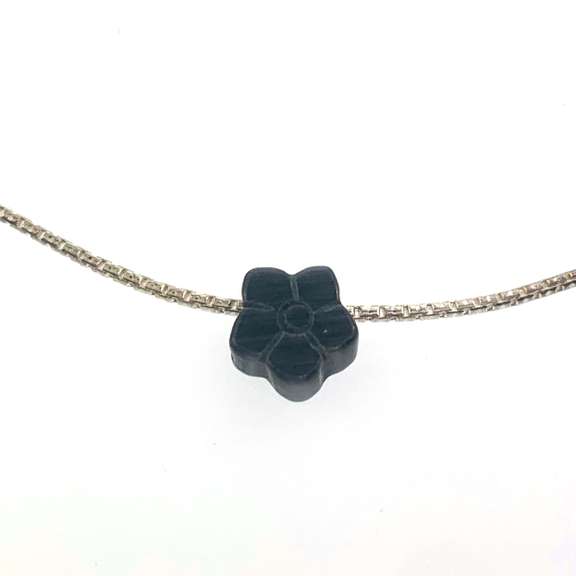 Sterling silver bracelet with dark grey flower charm