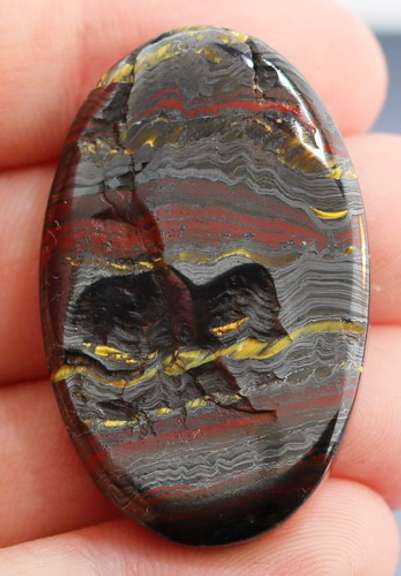 Dramatic 79.19ct Tiger Eye cabochon