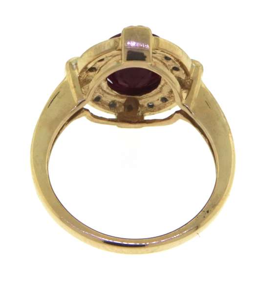 Handsome Oval Ruby and Diamond Halo Ring