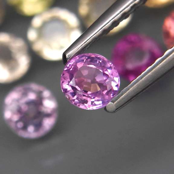 Fancy color 5.88ct UNHEATED VS Sapphire set