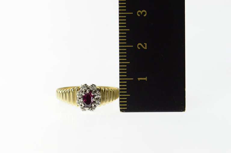 14K Yellow Gold Oval Ruby Diamond Accent Halo Grooved Ring