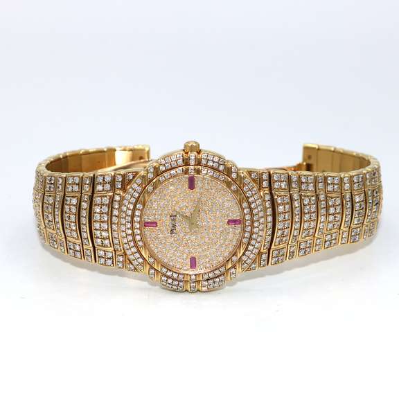 Very Rare and Collectable18kt Yellow Gold Diamond and Ruby Piaget Tanagra Watch