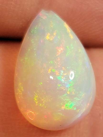 Pear cut 3.41ct floral fairy fire Welo Opal