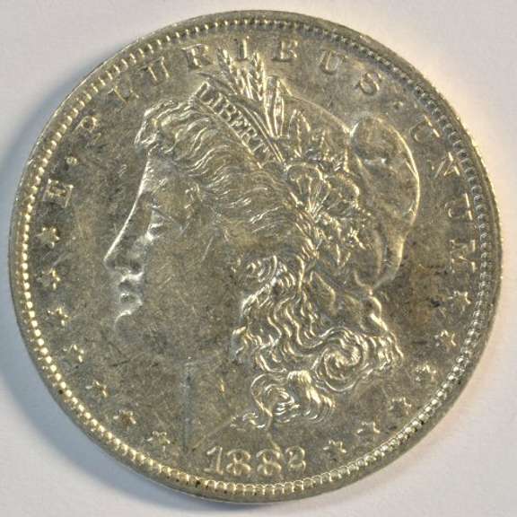 Scarce near mint 1882-O/S Morgan Silver Dollar. Nice