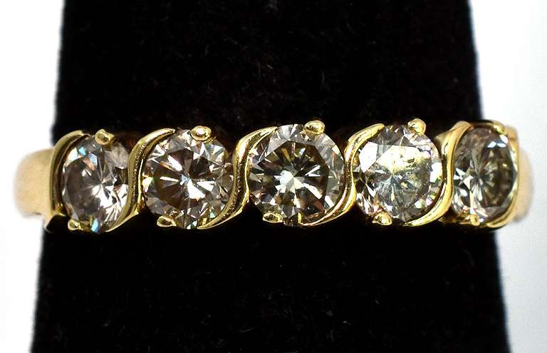 Dazzling 0.80CTW Diamond band in 14KT Yellow Gold