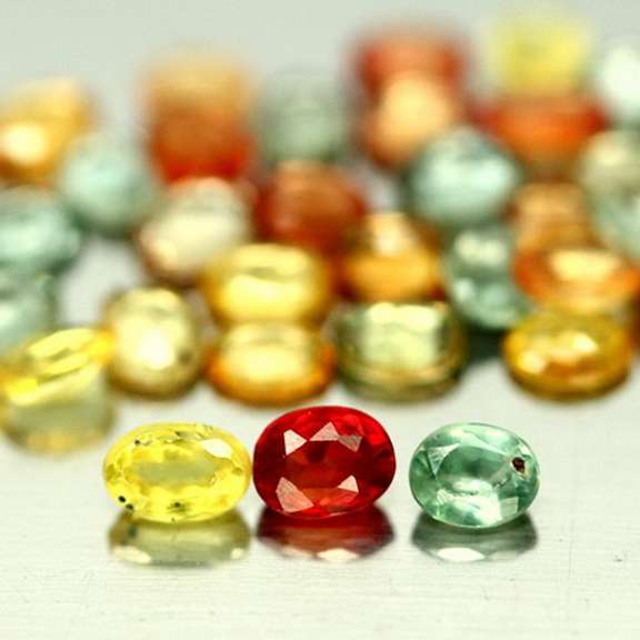 Heated only! Vibrant 6.92ct fancy color Sapphire set