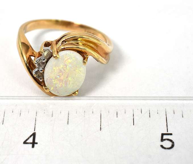 Enchanting Framed Opal & Diamond Ring in 14KT Yellow Gold