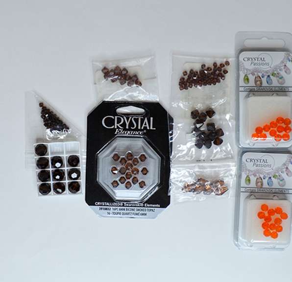 Assorted Lot of Swarovski Crystal Beads in Smoke and Topaz Tones