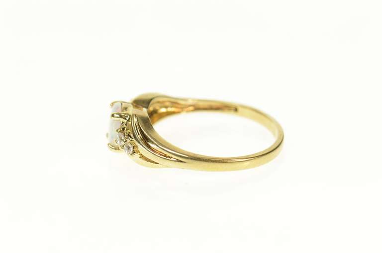 10K Yellow Gold Classic Syn. Opal CZ Accent Bypass Ring
