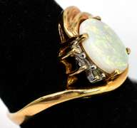 Enchanting Framed Opal & Diamond Ring in 14KT Yellow Gold