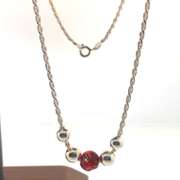 Sterling silver necklace with red and silver beads
