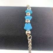 Sterling silver bracelet with light blue star charms and round silver beads