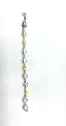 Sterling silver bracelet with yellow beads and silver heart charms