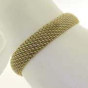 Eye Catching Wide Woven Yellow Gold Bracelet