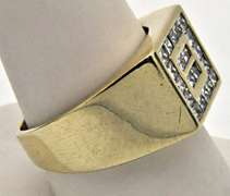 MEN'S 14KT GOLD AND DIAMOND RING.