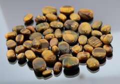 Huge collection of Tigerseye cabochons weighing 325 carats!