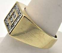 MEN'S 14KT GOLD AND DIAMOND RING.