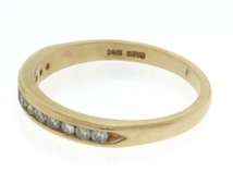 Eelgant Yellow Gold Diamond Channel Set Band