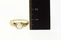 10K Yellow Gold Classic Syn. Opal CZ Accent Bypass Ring