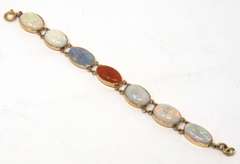 Dynamic Seven Bezel Set Shaped Cut Natural Multi Color Opals Bracelet