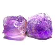 Bright purple 16.37ct uncut amethyst pair