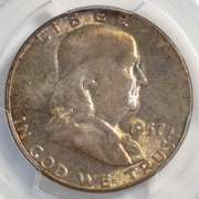 Toned 1957 PCGS MS 65 + Franklin Half Dollar