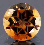 Rich red amber 2.20ct Imperial Topaz solitaire
