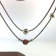 Sterling silver double strand necklace with orangish/brown and silver beads