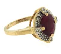 Handsome Oval Ruby and Diamond Halo Ring