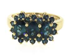 Wonderful 3 Stone Blue Topaz Yellow Gold Ring