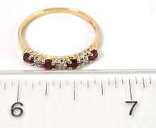 The Daintiest Ruby & Diamond Band in Yellow Gold