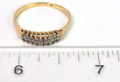 Glistening 0.14CTW Diamond Ring in Yellow Gold