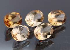 Sparkling 7.47ct peach champagne Topaz set