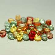 Heated only! Vibrant 6.92ct fancy color Sapphire set