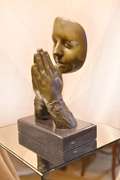Face with Praying Hands