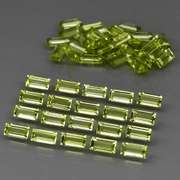 Dazzling 6.20ct untreated apple green Peridot set