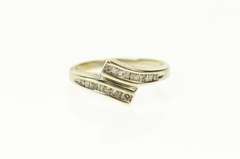 10K White Gold Round & Baguette Diamond Bypass Ring