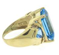 Charming Emerald Cut Blue Topaz & Diamond Ring