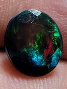 Smoldering floral block flashing 1.53ct Welo black Opal
