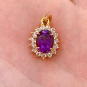 14kt Yellow Gold & Amethyst Halo Pendant