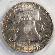 Toned 1957 PCGS MS 65 + Franklin Half Dollar