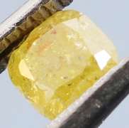 Rare .21ct emerald cut canary yellow Diamond