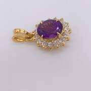 14kt Yellow Gold & Amethyst Halo Pendant